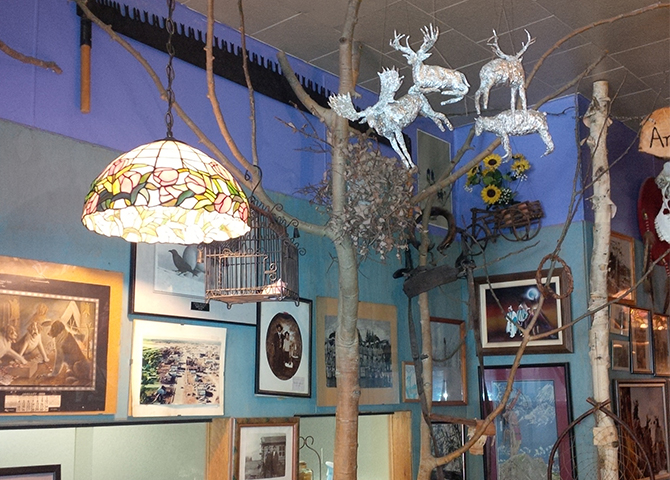 Inside Miss the Pas - showing tinfoil moose and deer hanging from the ceiling